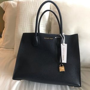 Michael Kors navy pebbled leather bag- never used